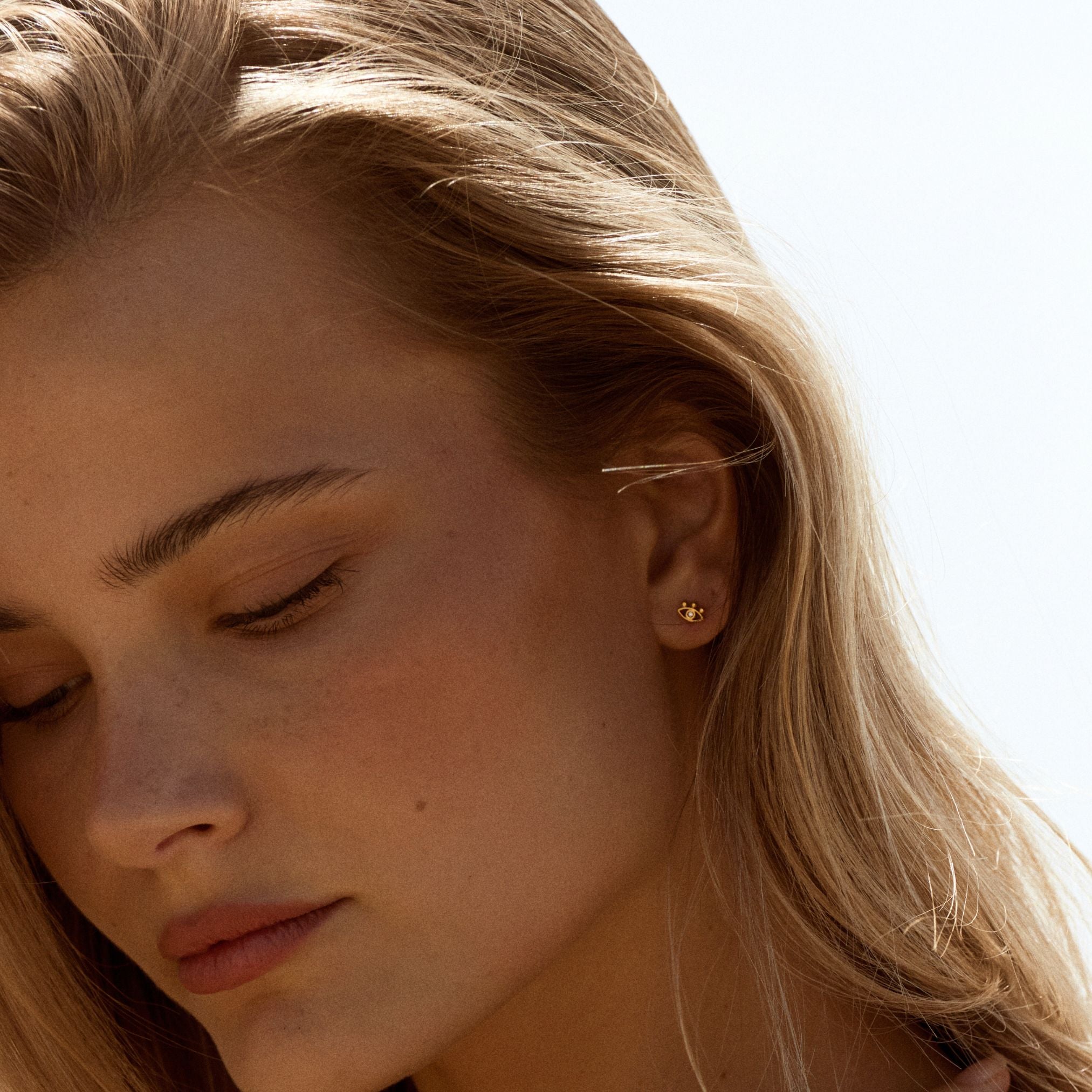 Gold Evil Eye Stud Earrings